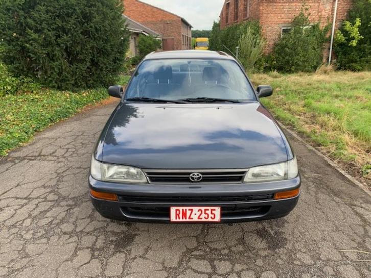 Oldtimer Toyota Corolla 1993, Auto's, Oldtimers, Particulier, Toyota, Benzine, Berline, 4 deurs, Automaat, Blauw, Blauw, Stof
