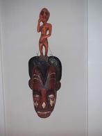 Origineel Afrikaans masker, Ophalen