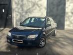 Mazda 323f 2002 1.3 benzine zo meenemen, Auto's, Mazda, Stof, 4 cilinders, Particulier, Euro 4