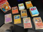 Pokémon Kaarten +- 400 (rare, common & holo) + Charizard tin, Ophalen of Verzenden, Zo goed als nieuw, Meerdere kaarten, Foil