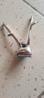 Tondeuse cheveux manuelle, Ophalen