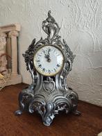 Horloge en etain, Enlèvement