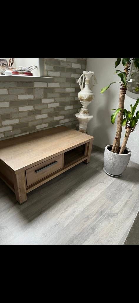 Nieuwe salontafel, Ophalen