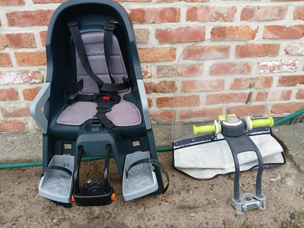 Kinder fietsstoeltje om vooraan op de fiets te bevestigen, Ophalen