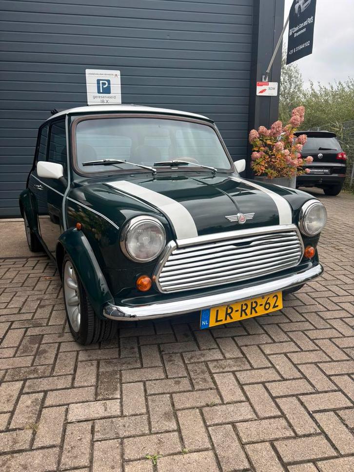 Classic mini cooper 1275 spi bouwjaar 1995, Auto's, Mini, Bedrijf, Cooper, Benzine, 2 deurs, Handgeschakeld, Groen, Zwart, Leder en Stof