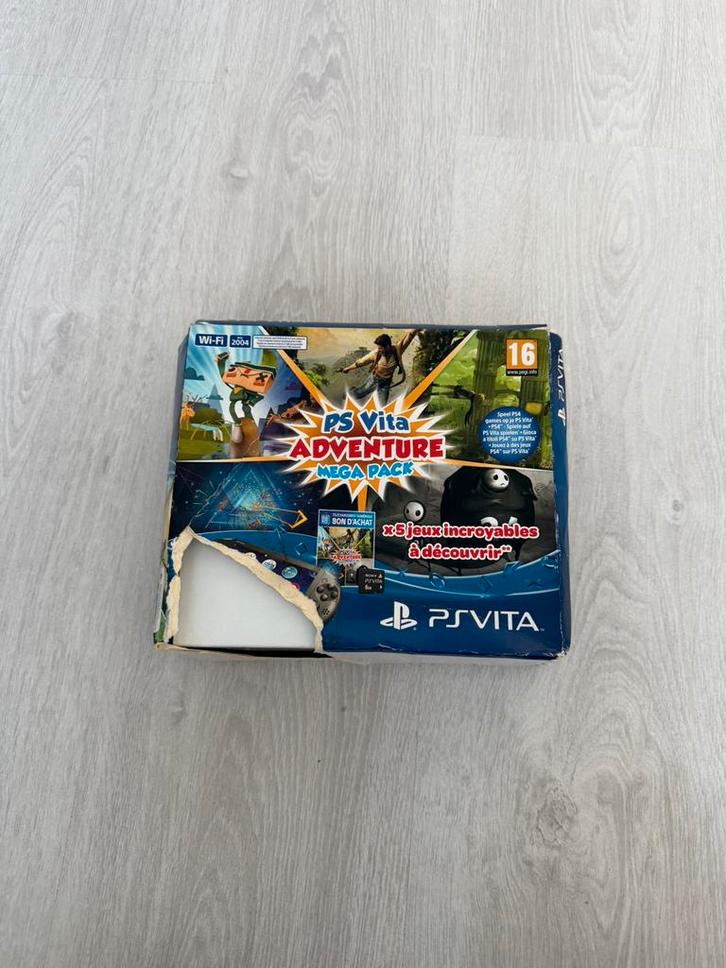 PS Vita Slim in doos met game, Games en Spelcomputers, Spelcomputers | Sony PlayStation Vita, Zo goed als nieuw, Zwart, Met games