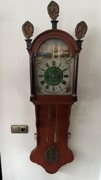 antieke klok uit 1850, Ophalen
