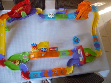 vtech toet toet baan met auto op afstandsbediening  beschikbaar voor biedingen