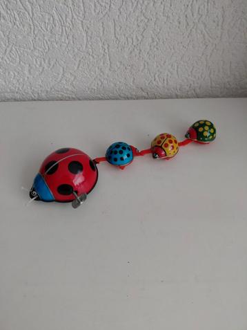 Vintage blikken lieveheersbeestjes beschikbaar voor biedingen