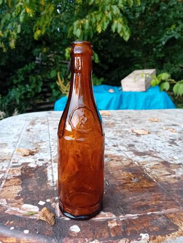 Oude  bierfles brouwerij La Grande Brasserie Koekelberg beschikbaar voor biedingen