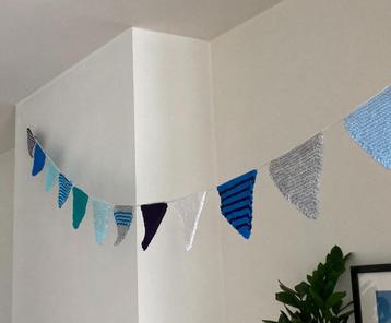 Vlaggenlijn decoratie in wol beschikbaar voor biedingen