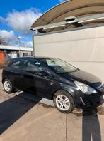 Opel Corsa 1.2 benzine 2012, Auto's, Euro 5, Leder en Stof, Zwart, Handgeschakeld