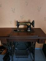 Oude singer naaimachine, Ophalen