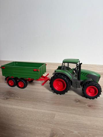Speelgoedtractor met aanhangwagen beschikbaar voor biedingen