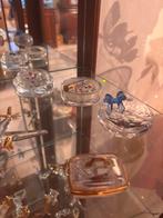 Swarovski beeldjes, Ophalen