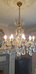 Kroonluchter in  brons en kristal, Ophalen