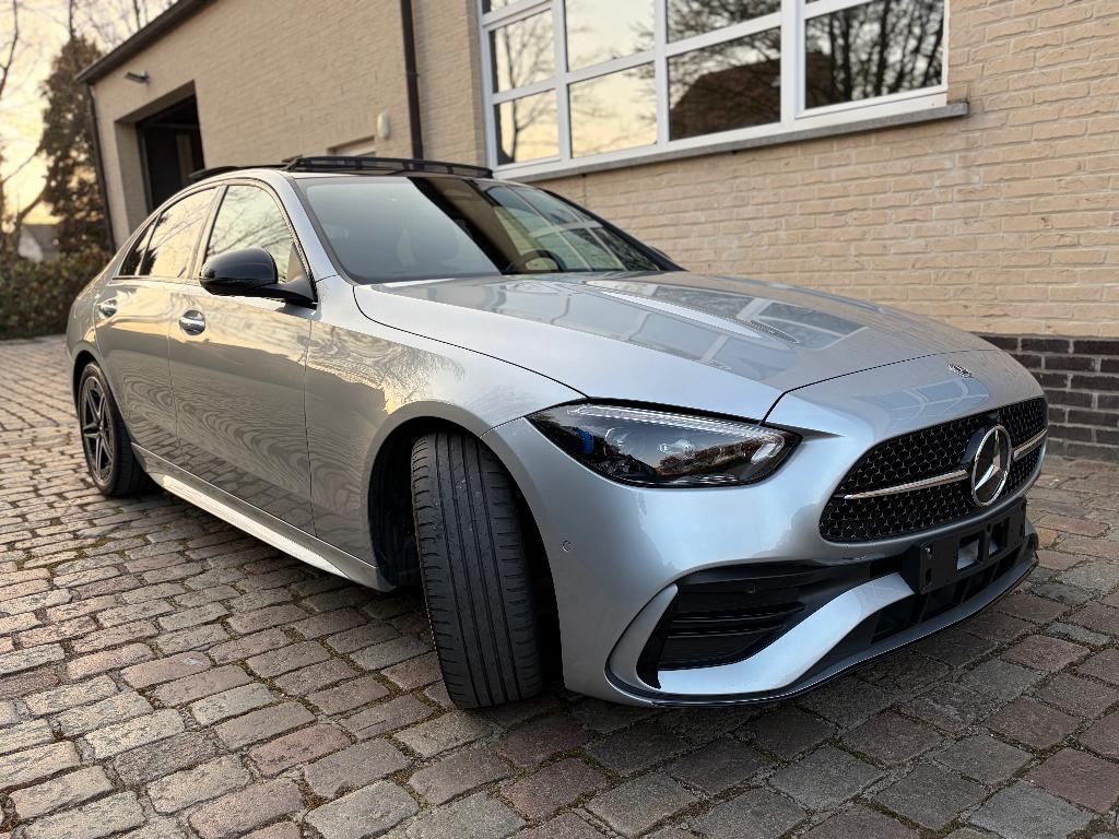 Mercedes-Benz C 180 AMG Line Pano Head up display 32000 km, Autos, Mercedes-Benz, Cuir, Argent ou Gris, Achat, Euro 6