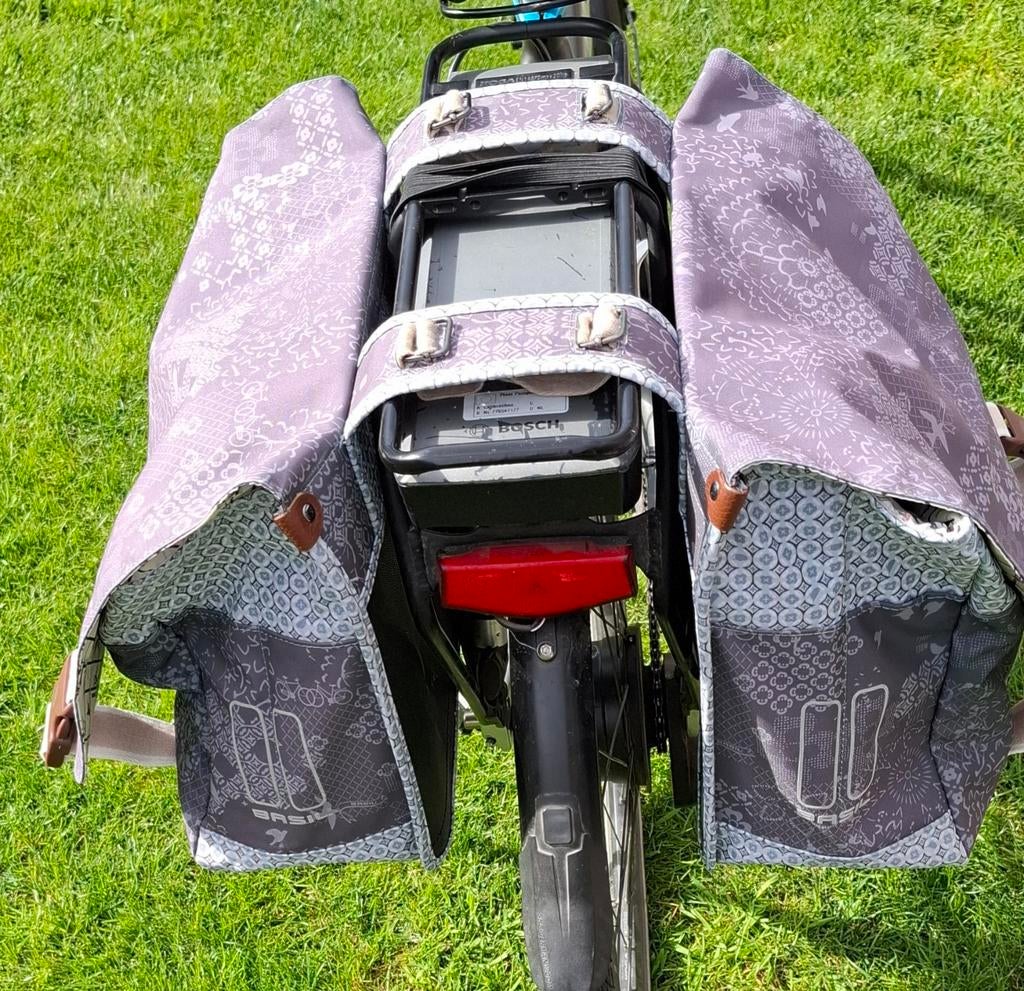 Dubbele fietstas, Ophalen