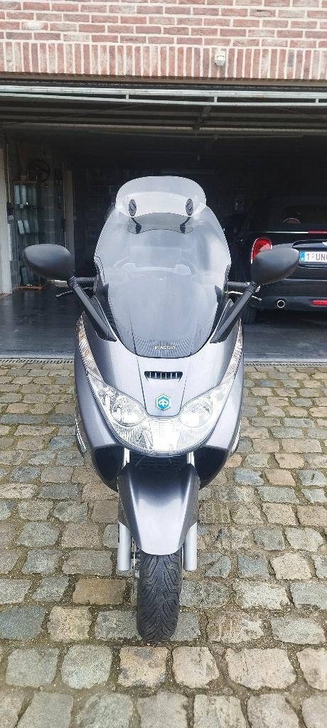 mooi onderhouden scooter, Ophalen, 400 cc, Zo goed als nieuw, Benzine