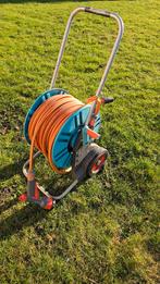 Tuinslang met haspel en spuitpistool GARDENA., Tuin en Terras, Ophalen