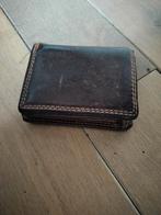 Portemonnee leer, Ophalen