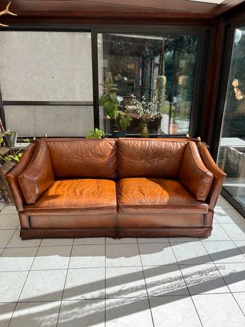 Lederen zitbank beschikbaar voor biedingen