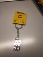 lego 851406 chroomzilveren sleutelhanger met blokje 2×4, Kinderen en Baby's, Nieuw, Ophalen of Verzenden, Lego, Losse stenen