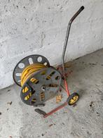 Tuinslang op rol, Ophalen, Gebruikt, Tuinslang