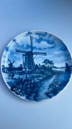 Delft blauw bord, Ophalen