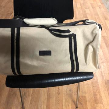 Sac de voyage en tissu beige très bonne état 