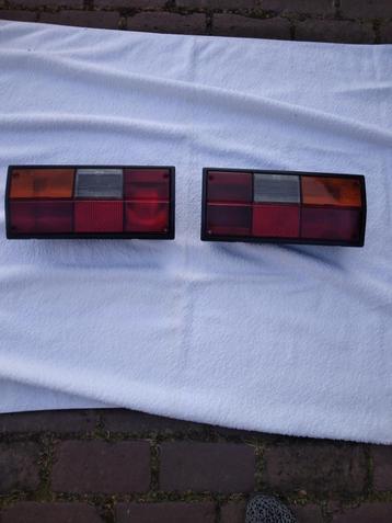 VW T3 Achterlichten HELLA met mistlamp en lampendragers beschikbaar voor biedingen