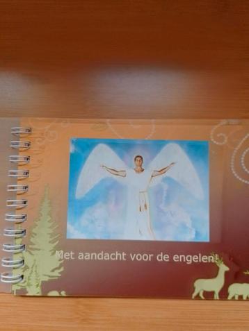 Engelen fotoboekje beschikbaar voor biedingen
