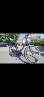 Elektrische fiets te koop in uitstekende staat en weinig km., Fietsen en Brommers, Zo goed als nieuw, 51 tot 55 cm, 50 km per accu of meer