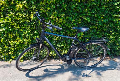 Electrishe herenfiets framemaat M raleigh stoker, Fietsen en Brommers, Elektrische fietsen, Gebruikt, Ophalen