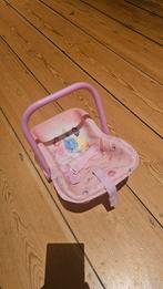 Maxi cosi voor poppen, Ophalen