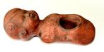 Poppenlijfje terracotta, Ophalen