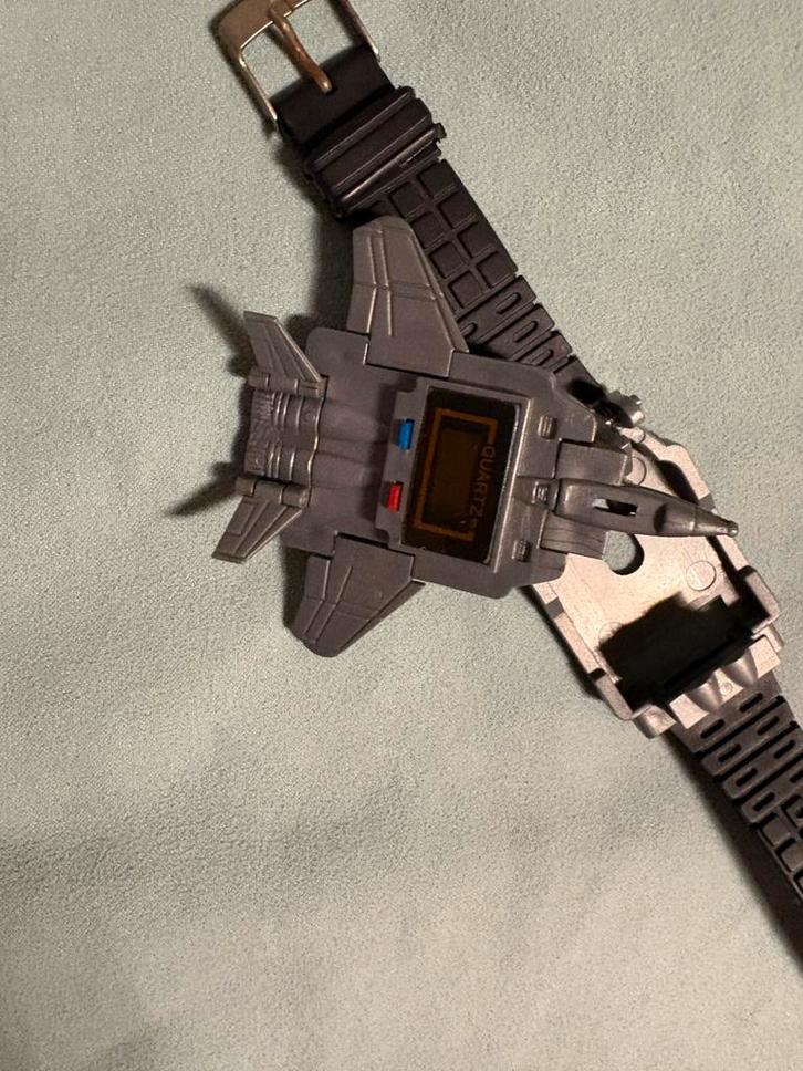 TRANSFORMERS G1 VINTAGE STRAALJAGERPOLSHORLOGE, Verzamelen, Transformers, Zo goed als nieuw, G1, Overige rassen, Ophalen of Verzenden