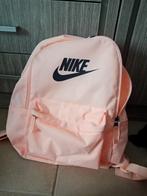 Nike rugzak roze, Ophalen