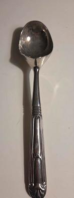 Verzilverde ijs-schep-lepel, Enlèvement