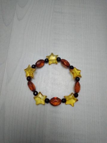 Bracelet en ambre avec étoiles et perles