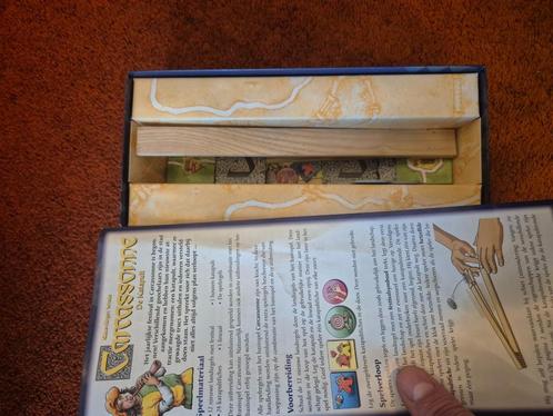 Carcassonne - De Katapult (NL), Hobby en Vrije tijd, Gezelschapsspellen | Bordspellen, Zo goed als nieuw, Een of twee spelers