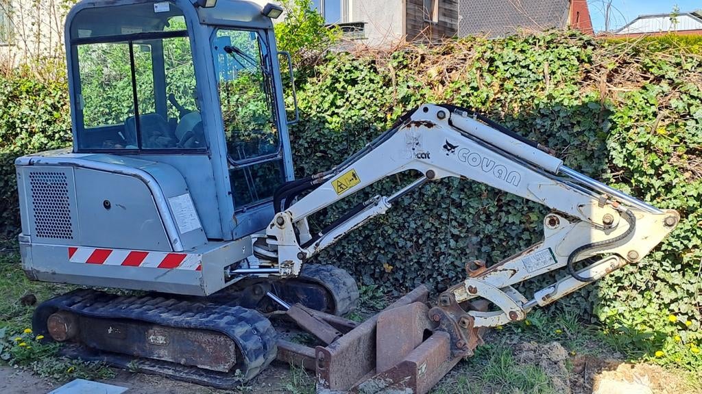 Bobcat 325 graafkraan., Ophalen