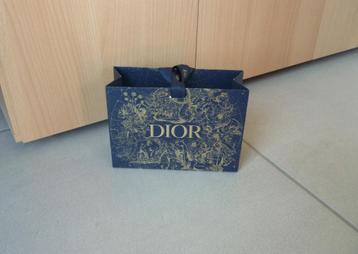 Donkerblauw papieren cadeauzakje geschenktas gouden dieren beschikbaar voor biedingen