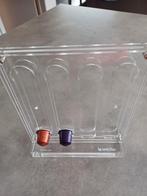 Nespresso cuphouder, Ophalen
