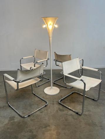 Buisframe vintage stoelen met wit leder 