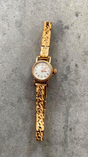 Klein mechanisch LIP-horloge voor dames beschikbaar voor biedingen