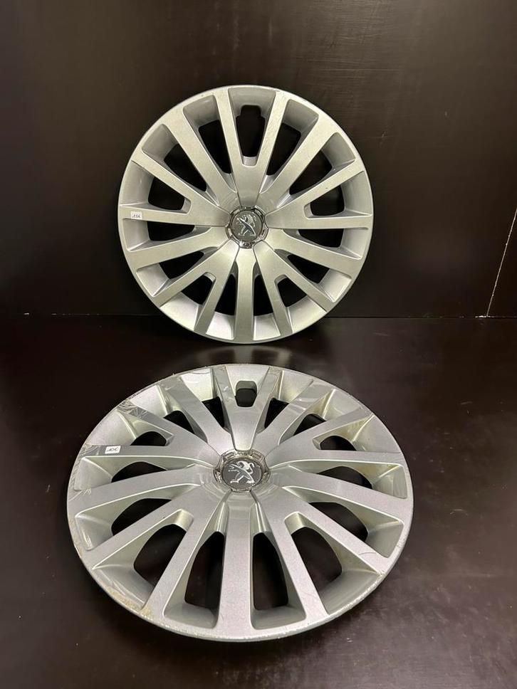 2 wieldoppen Peugeot 207,208,307,308, partner 15", Auto diversen, Wieldoppen, Gebruikt, Ophalen of Verzenden