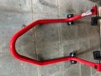 Paddock stand achterwiel, Motoren, Ophalen