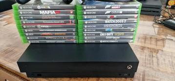 Xbox one x met 18 spellen  beschikbaar voor biedingen