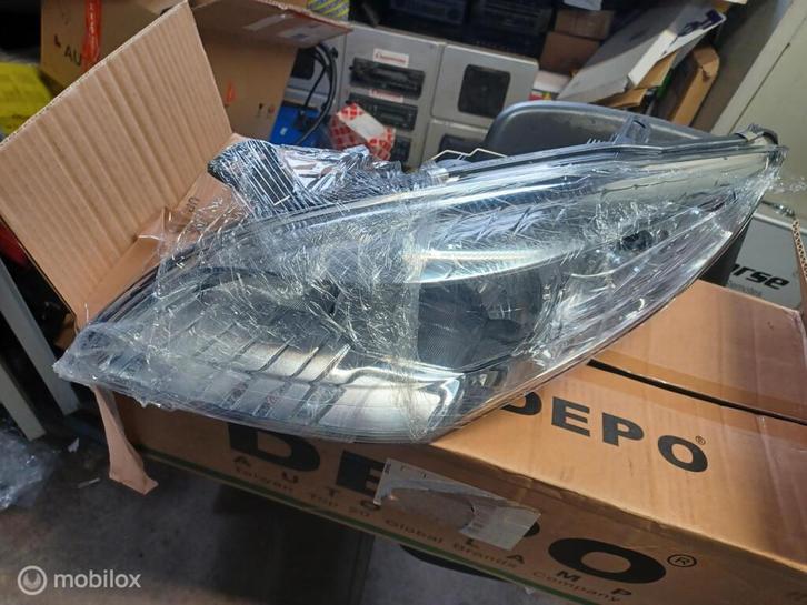 Koplamp links Renault Megane Coupé III   4377961 260605985R, Auto-onderdelen, Verlichting, Renault, Nieuw, Ophalen of Verzenden